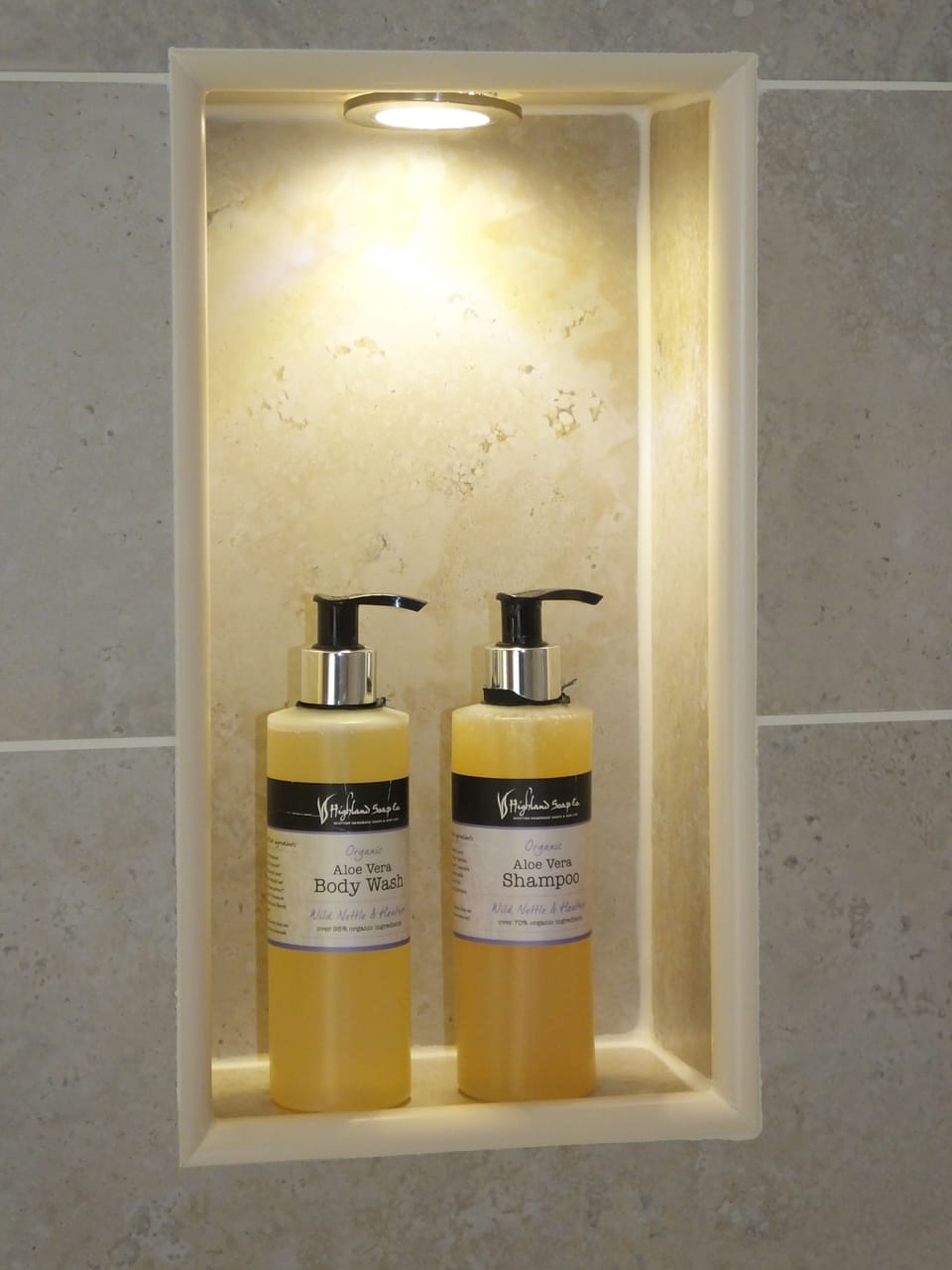 Shower, designer toiletries, hair dryer, towels