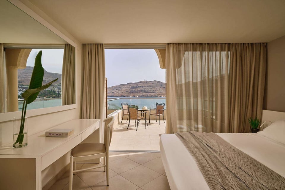 Deluxe Double Room, Beach View | Individually decorated, individually furnished, free WiFi, bed sheets