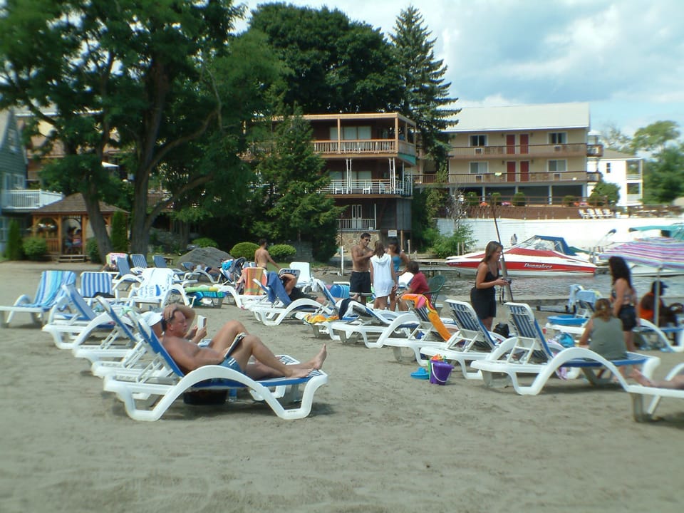 On the beach, sun loungers, kayaking, rowing