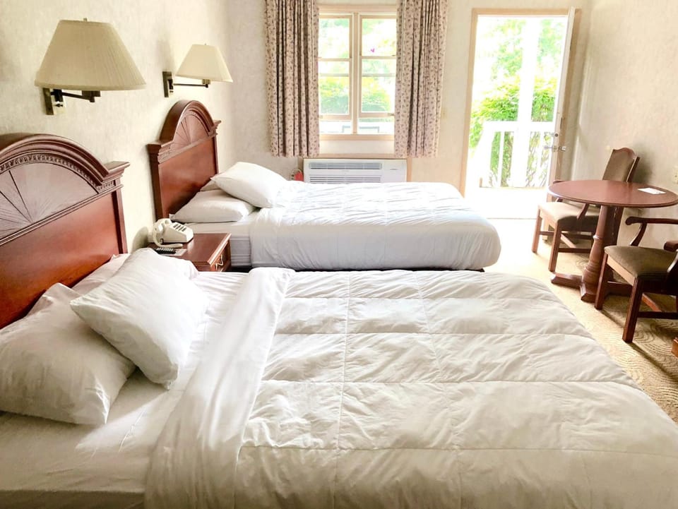 Blackout drapes, iron/ironing board, free WiFi, bed sheets