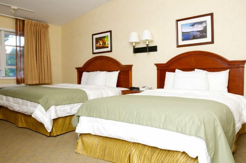 Blackout drapes, iron/ironing board, free WiFi, bed sheets