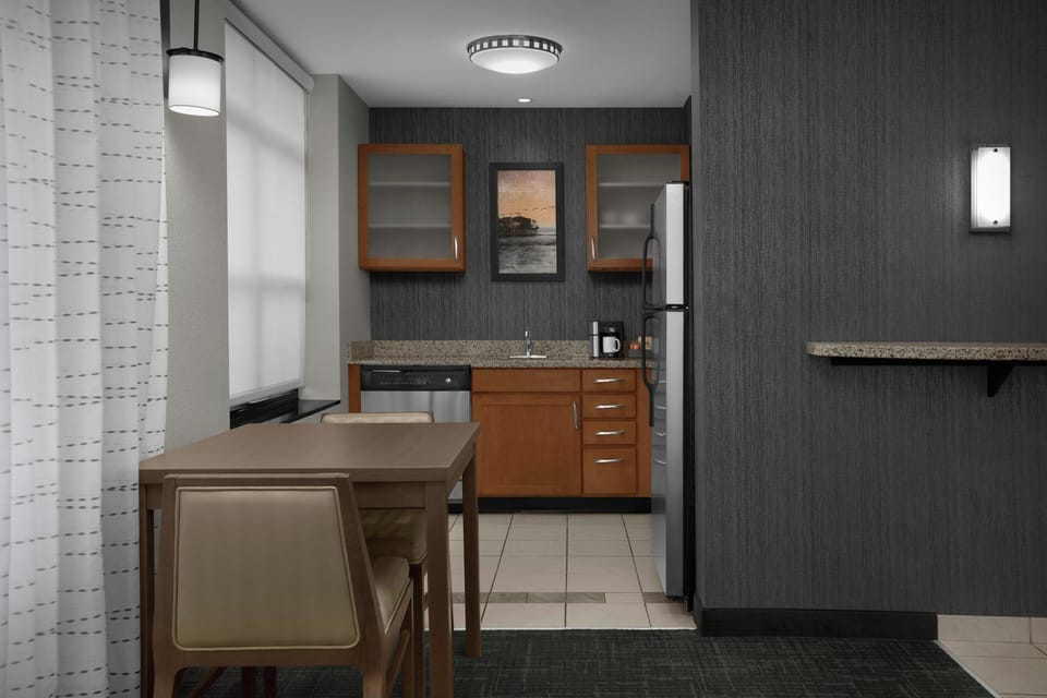 Studio, 1 King Bed with Sofa bed (Corner) | Private kitchen | Full-size fridge, microwave, stovetop, dishwasher