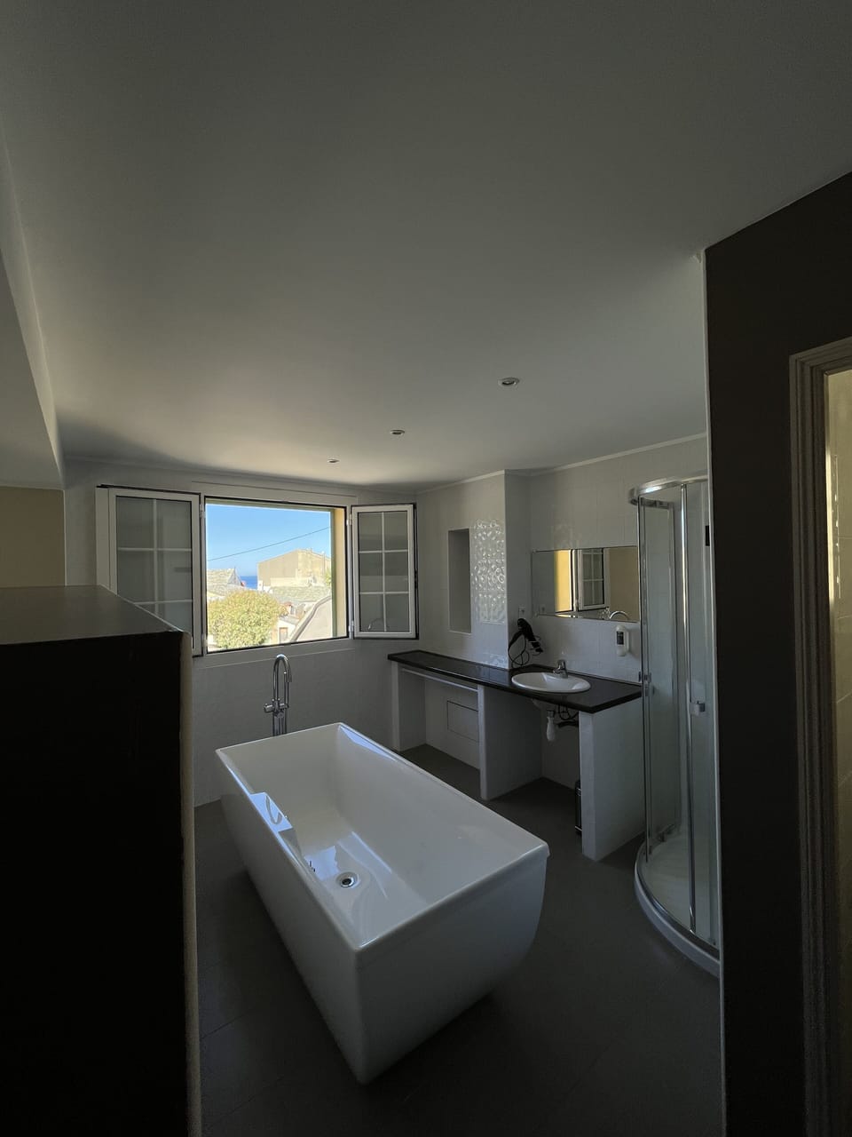 Shower, free toiletries, hair dryer, towels