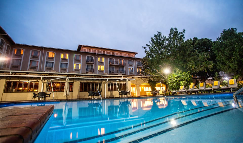 Outdoor pool, open 6:00 AM to 7:00 PM, pool umbrellas, sun loungers