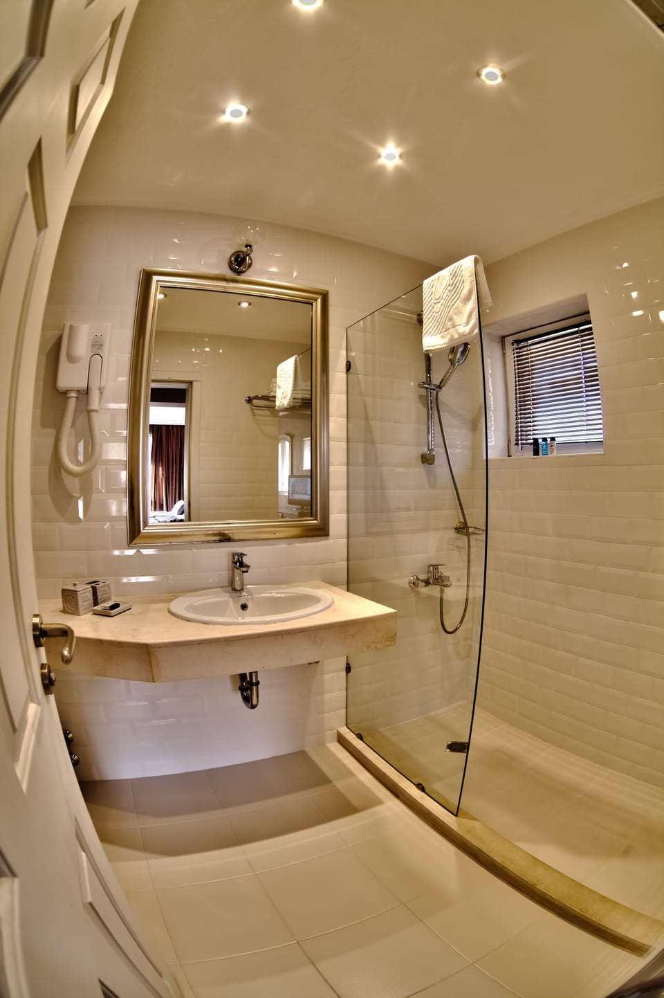 Classic Double Room Single Use | Bathroom | Free toiletries, hair dryer, slippers, towels
