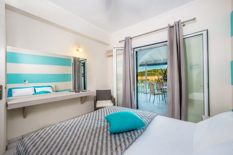 Family Apartment | Premium bedding, iron/ironing board, free cribs/infant beds