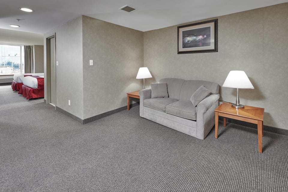 Family Suite, Multiple Beds, Refrigerator & Microwave, Tower | Iron/ironing board, rollaway beds, free WiFi, bed sheets