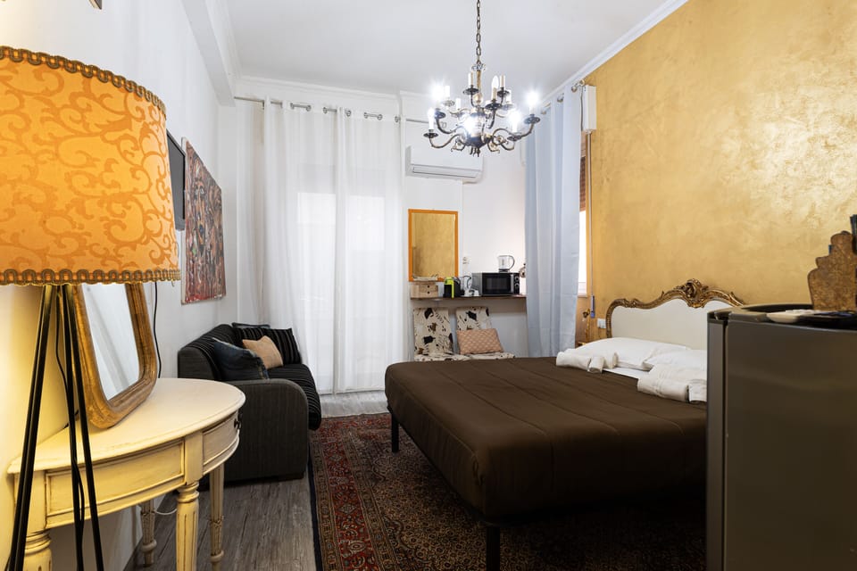 Double Room | Minibar, desk, iron/ironing board, free cribs/infant beds
