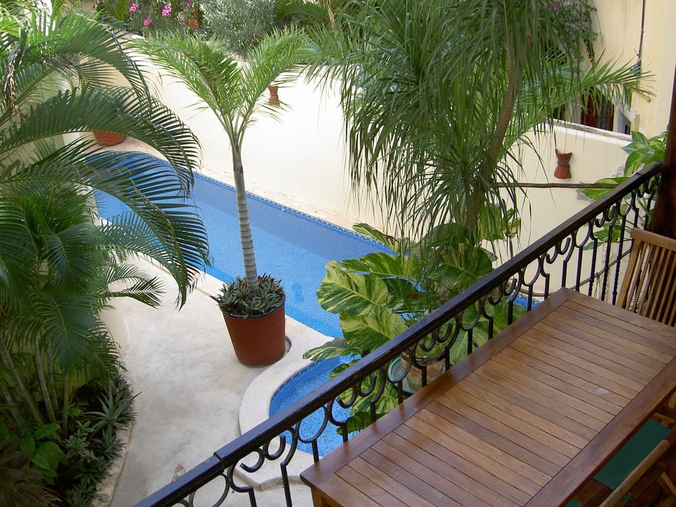 Lush Gardens and Tiled Pool.