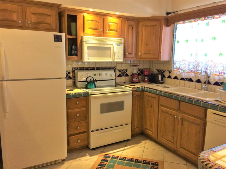 Family Villa, 3 Bedrooms | Private kitchen | Full-size fridge, microwave, stovetop, coffee/tea maker