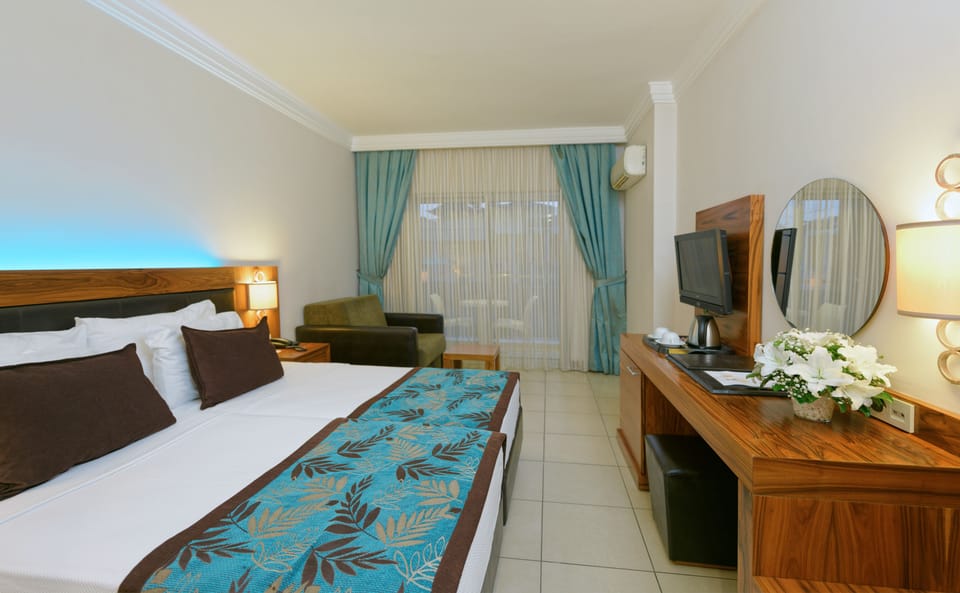 Premium bedding, free minibar, in-room safe, desk