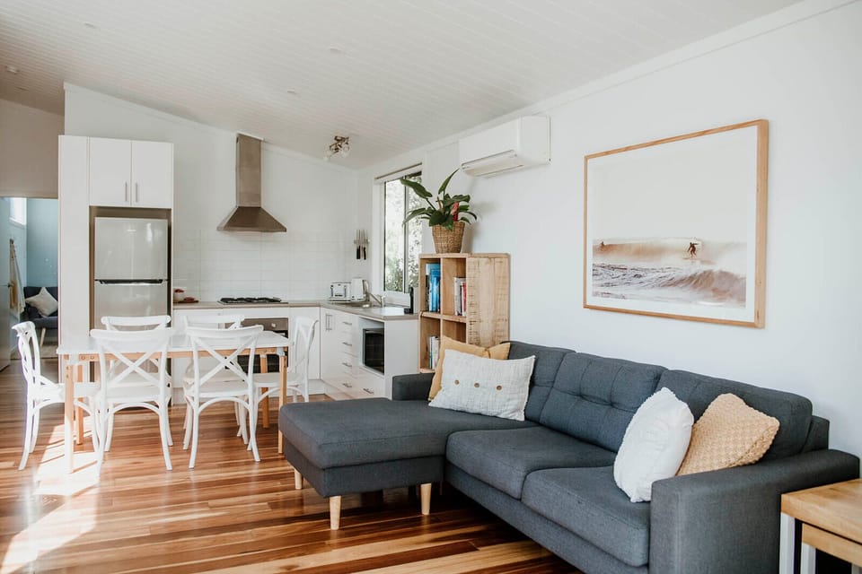 Deluxe Cabin, 2 Bedrooms | Living area | 32-inch Smart TV with digital channels