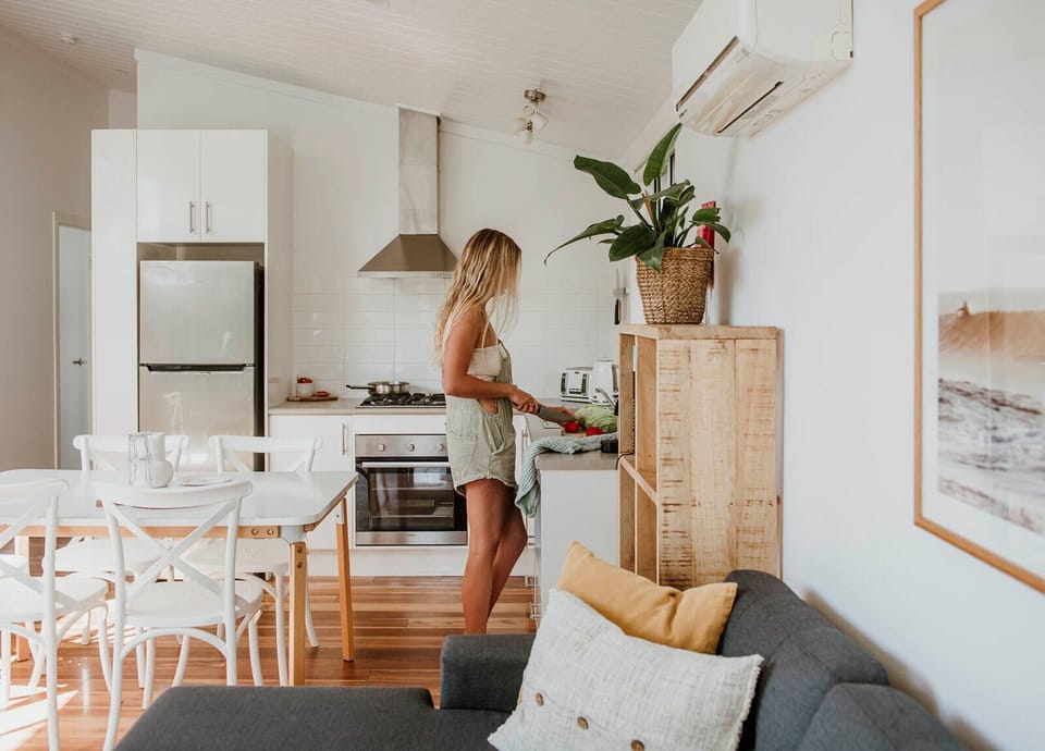Deluxe Cabin, 2 Bedrooms | Private kitchen | Full-size fridge, toaster, cookware/dishes/utensils