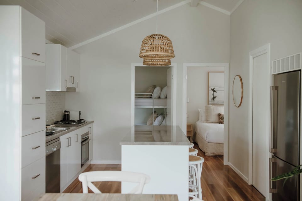 Deluxe Cabin, 2 Bedrooms | Private kitchen | Full-size fridge, toaster, cookware/dishes/utensils