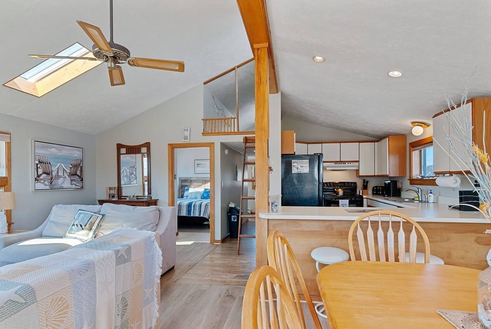 Ceiling fan and skylights for a bright airy ocean experience