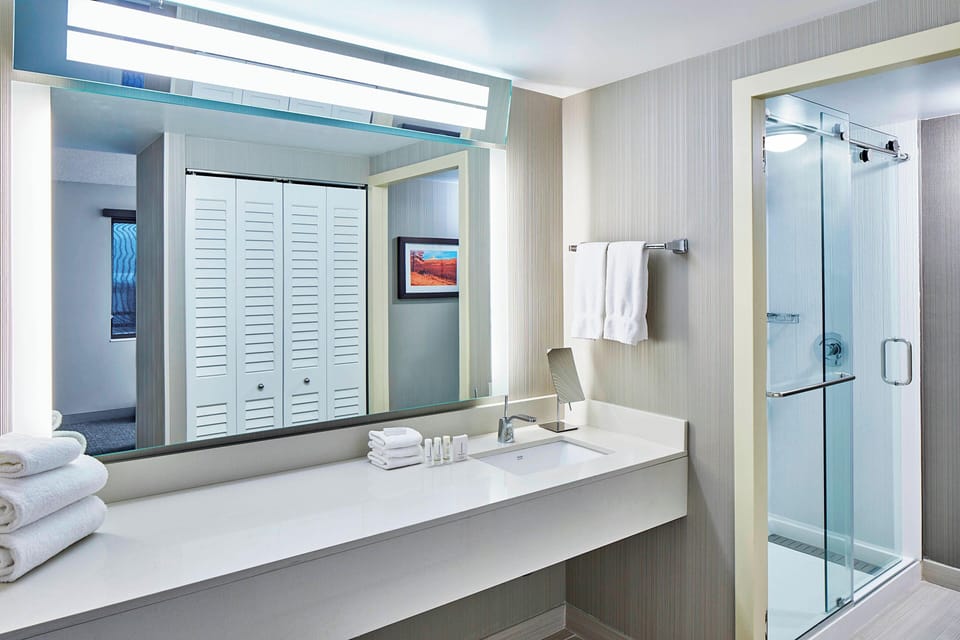 Suite, 1 Bedroom, Balcony | Bathroom | Free toiletries, hair dryer, towels, soap