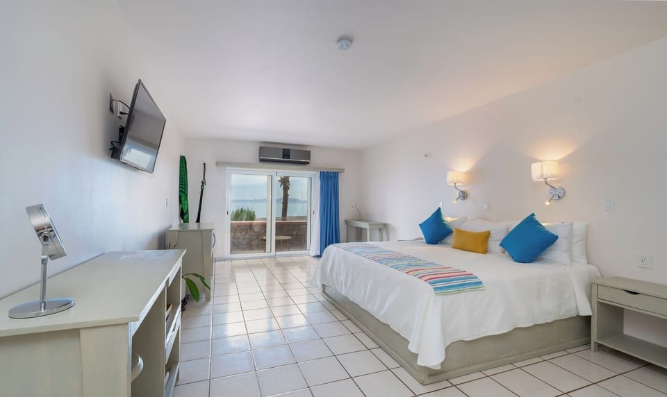 Basic Suite, Ocean View | Pillowtop beds, in-room safe, iron/ironing board, free WiFi