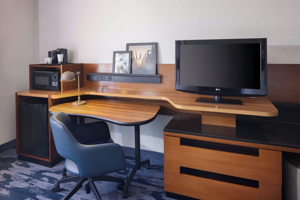 Suite, 1 King Bed with Sofa bed | Desk, laptop workspace, blackout drapes, iron/ironing board