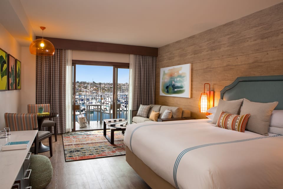 Marina View Junior Suite King | Premium bedding, minibar, in-room safe, individually decorated