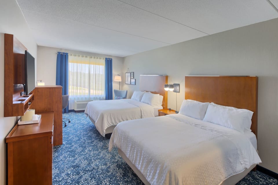 Premium bedding, down comforters, Select Comfort beds, desk