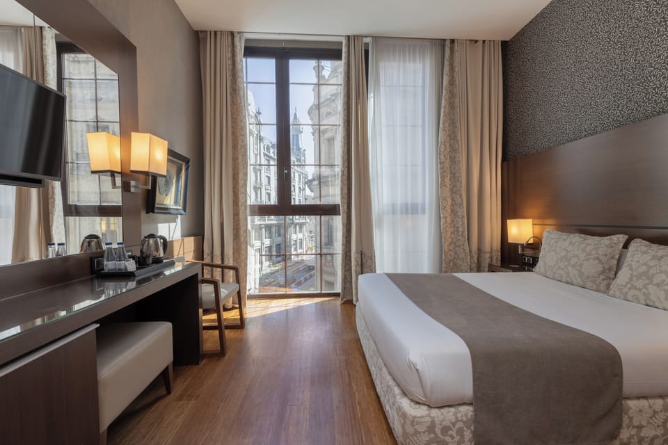 In-room safe, desk, laptop workspace, blackout drapes