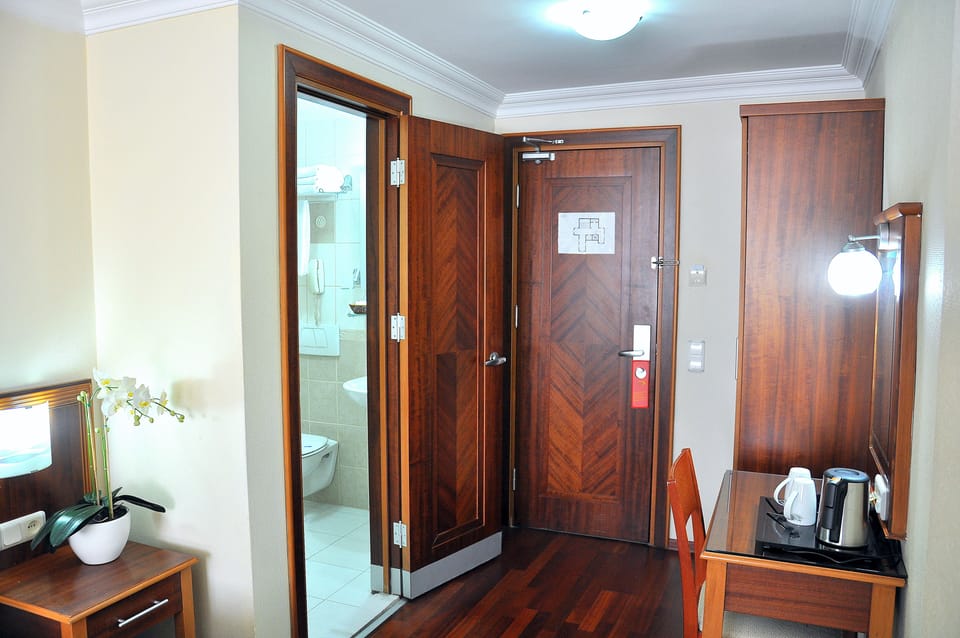 Standard Triple Room | Minibar, in-room safe, soundproofing, free WiFi