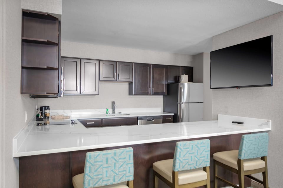 Suite, 1 King Bed, Non Smoking | Hypo-allergenic bedding, desk, laptop workspace, blackout drapes