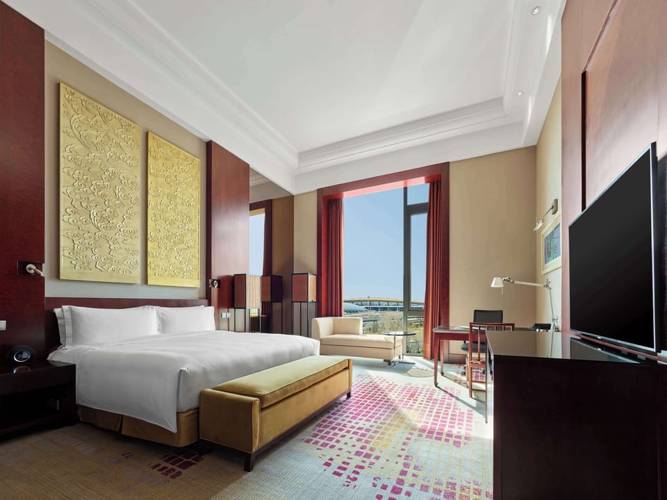 Premium bedding, down comforters, memory foam beds, minibar