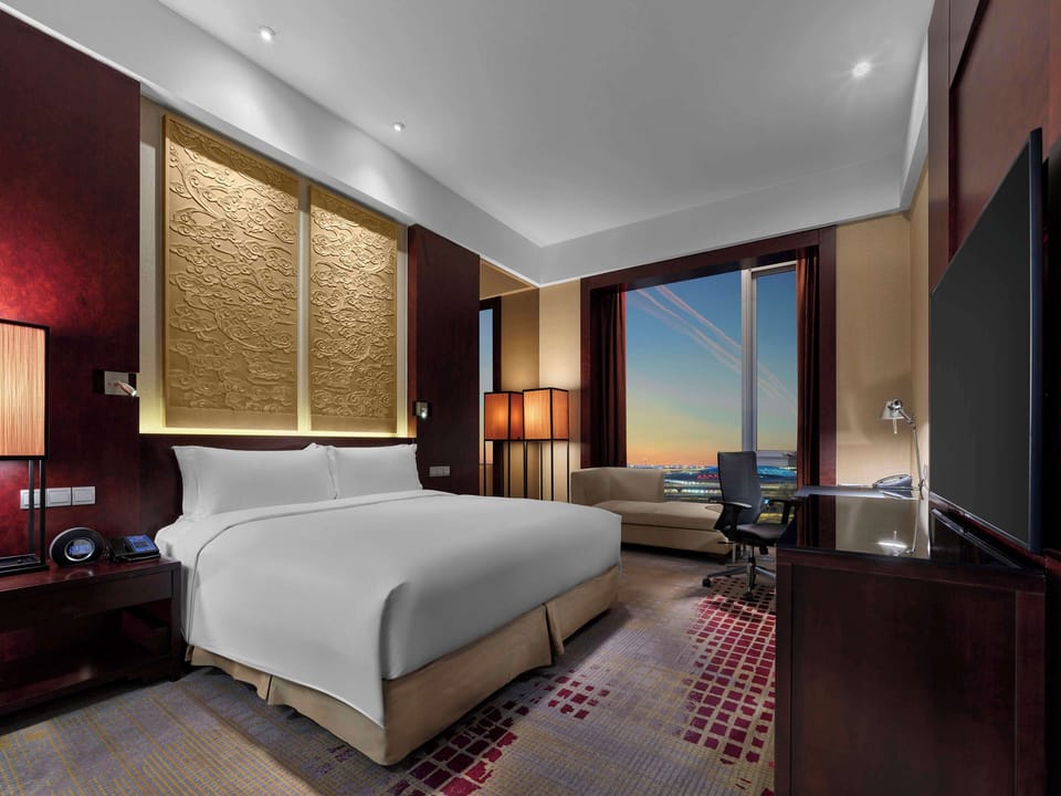 Two Bedrooms Duplex Suite | Living area | 55-inch LCD TV with satellite channels, TV