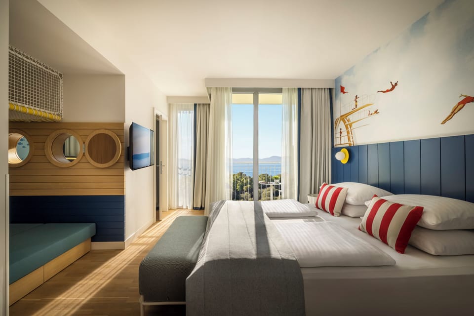Family Room, Balcony, Partial Sea View (Deluxe Seaside) | Beach/ocean view