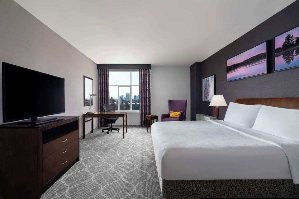 Premium bedding, down comforters, desk, blackout drapes