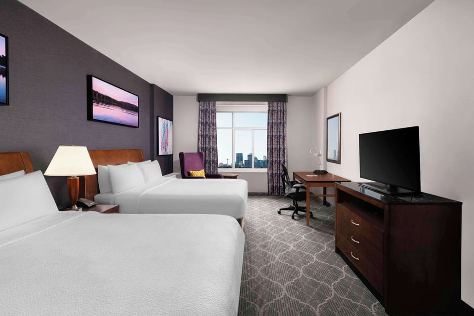 Premium bedding, down comforters, desk, blackout drapes