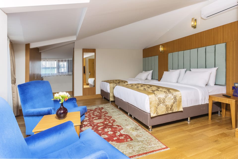 Superior Loft, Balcony, City View | Premium bedding, minibar, in-room safe, desk