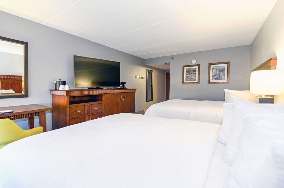 Room, 2 Queen Beds | In-room safe, iron/ironing board, free cribs/infant beds, Internet
