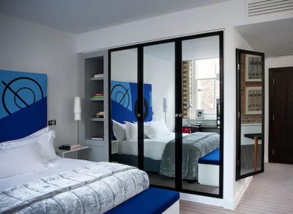 Boundary Room | Minibar, in-room safe, individually decorated, individually furnished