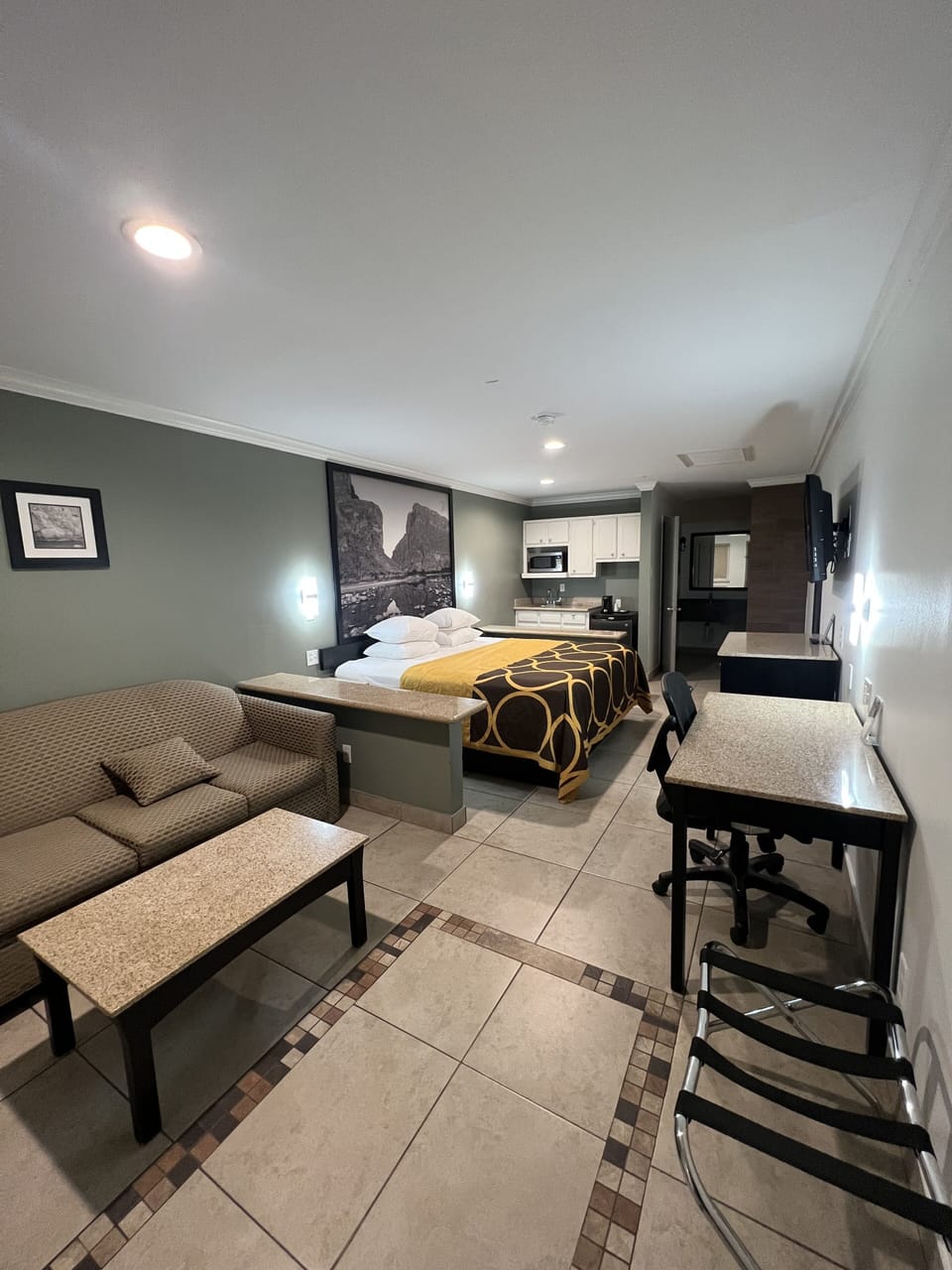 Suite, 1 King Bed, Non Smoking | Desk, iron/ironing board (on request), WiFi (free), bed sheets