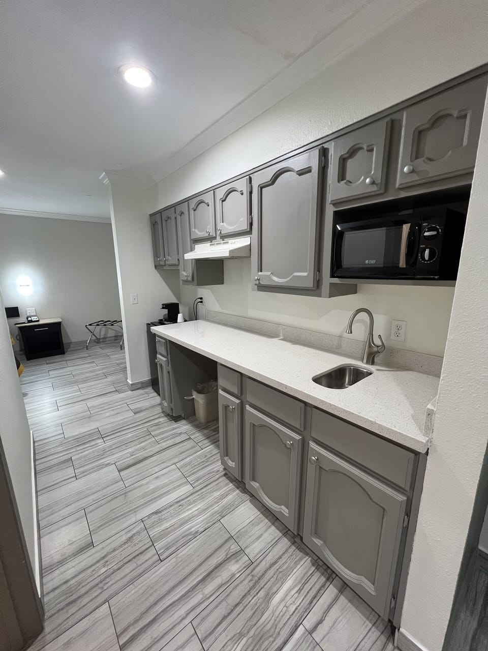 Suite (1 King and 1 Queen bed) | Private kitchen | Fridge, microwave