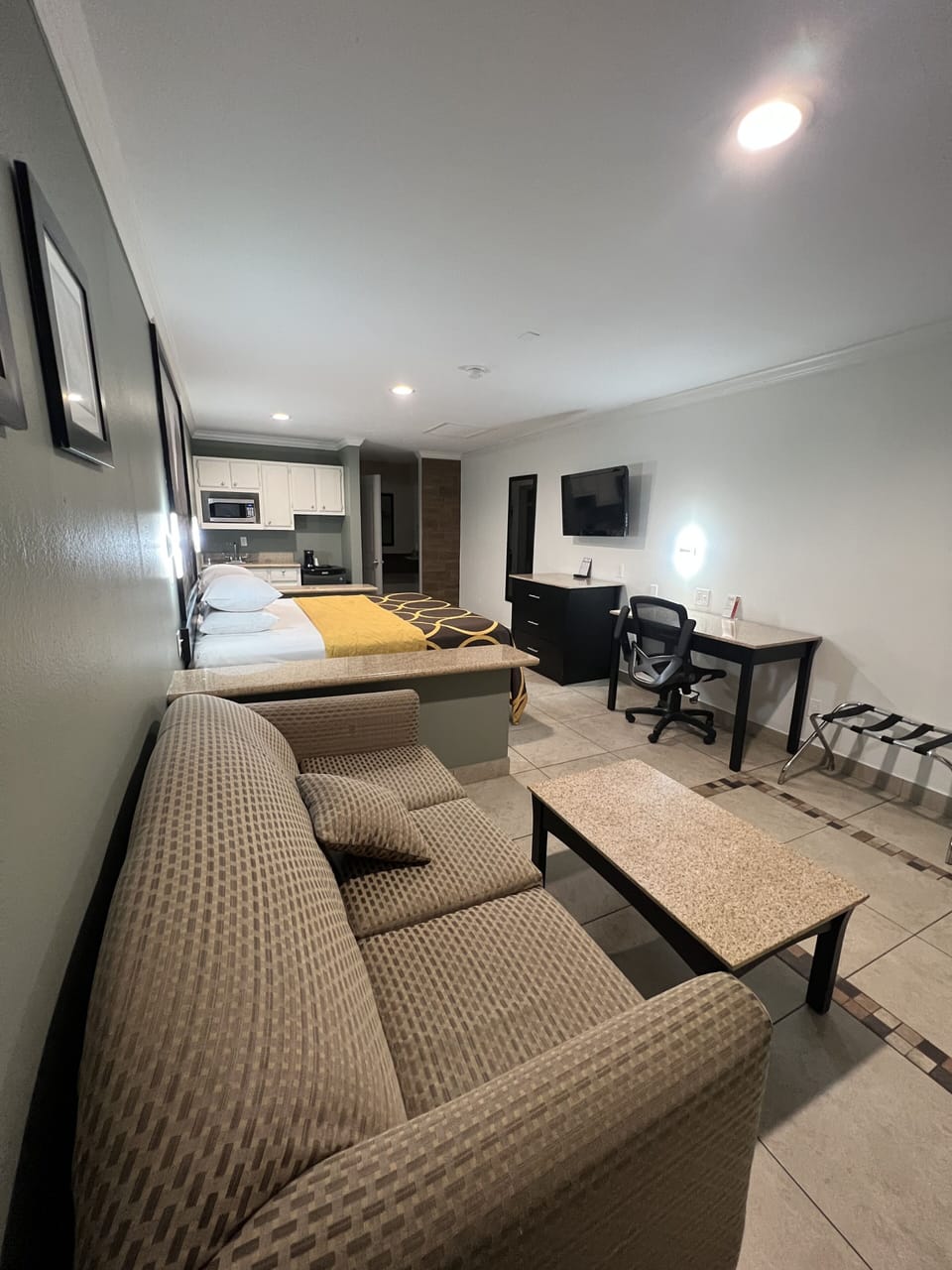 Suite, 1 King Bed, Non Smoking | Desk, iron/ironing board (on request), WiFi (free), bed sheets