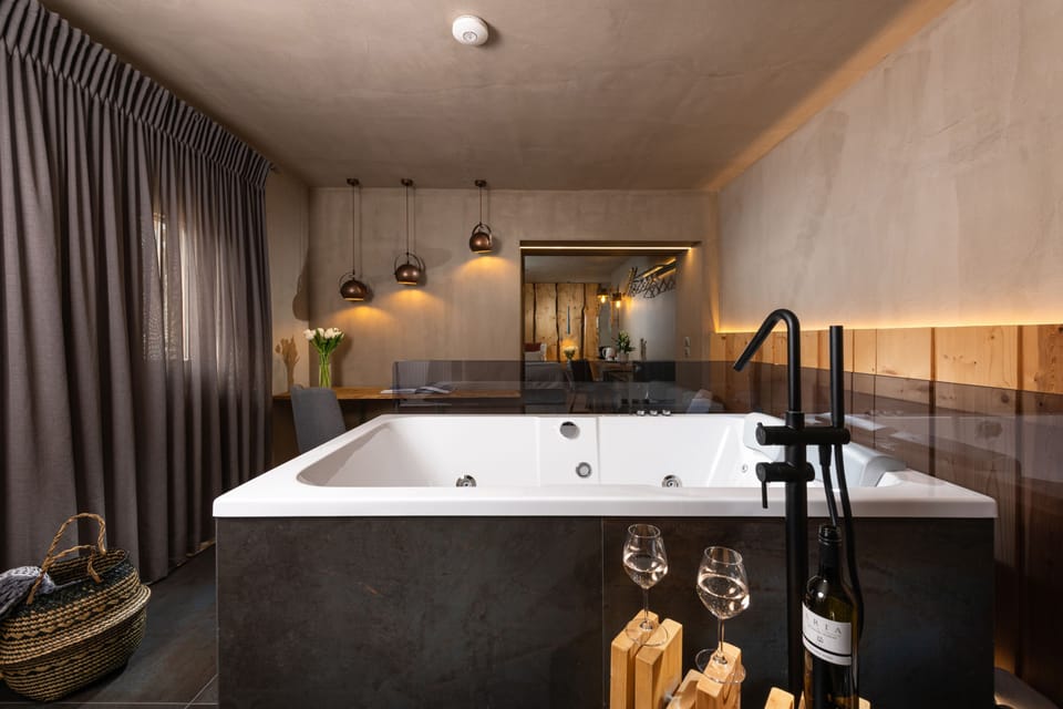The Wood Junior Suite with Hot Tub | Private spa tub