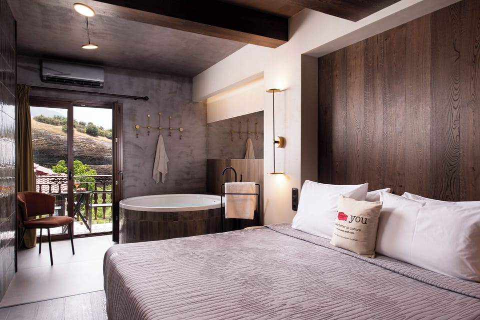 The Hot Tub Suite with Fireplace & Steam Shower | Private spa tub