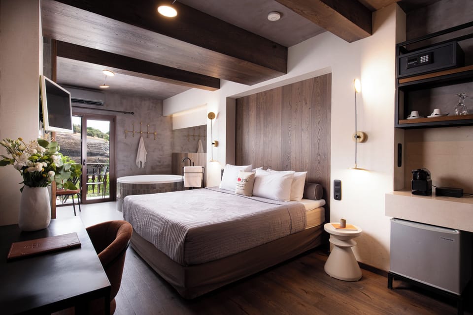 The Hot Tub Suite with Fireplace & Steam Shower | Egyptian cotton sheets, premium bedding, down comforters, pillowtop beds