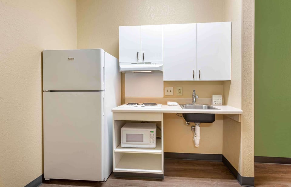 Studio, 1 Queen Bed, Accessible, Non Smoking | Private kitchen | Full-size fridge, microwave, stovetop, coffee/tea maker