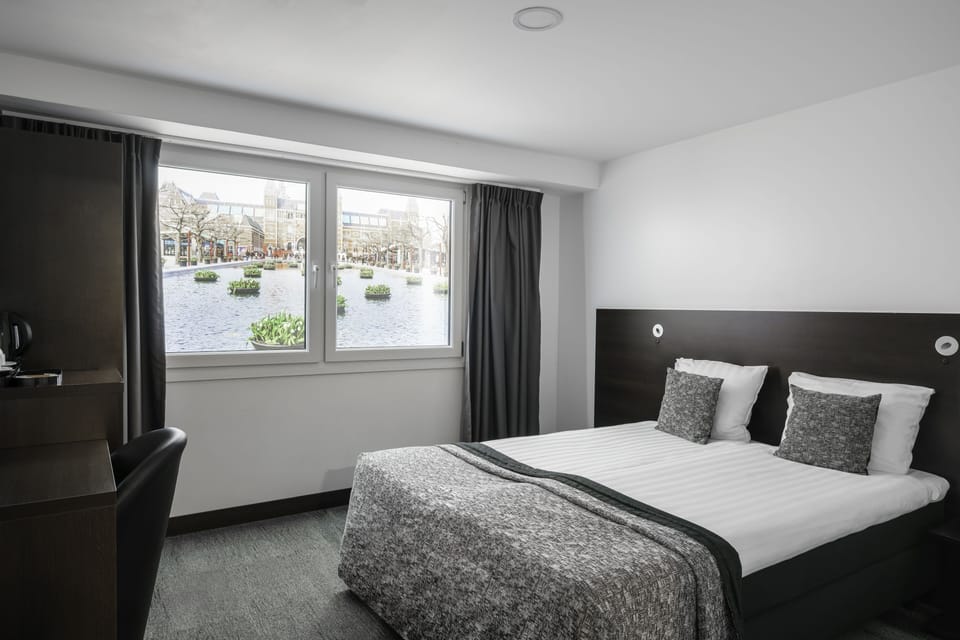 Basement Double Room - no window | In-room safe, desk, laptop workspace, iron/ironing board