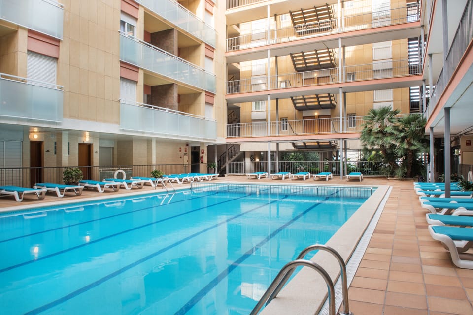 Outdoor pool, open 10:00 AM to 8:00 PM, sun loungers