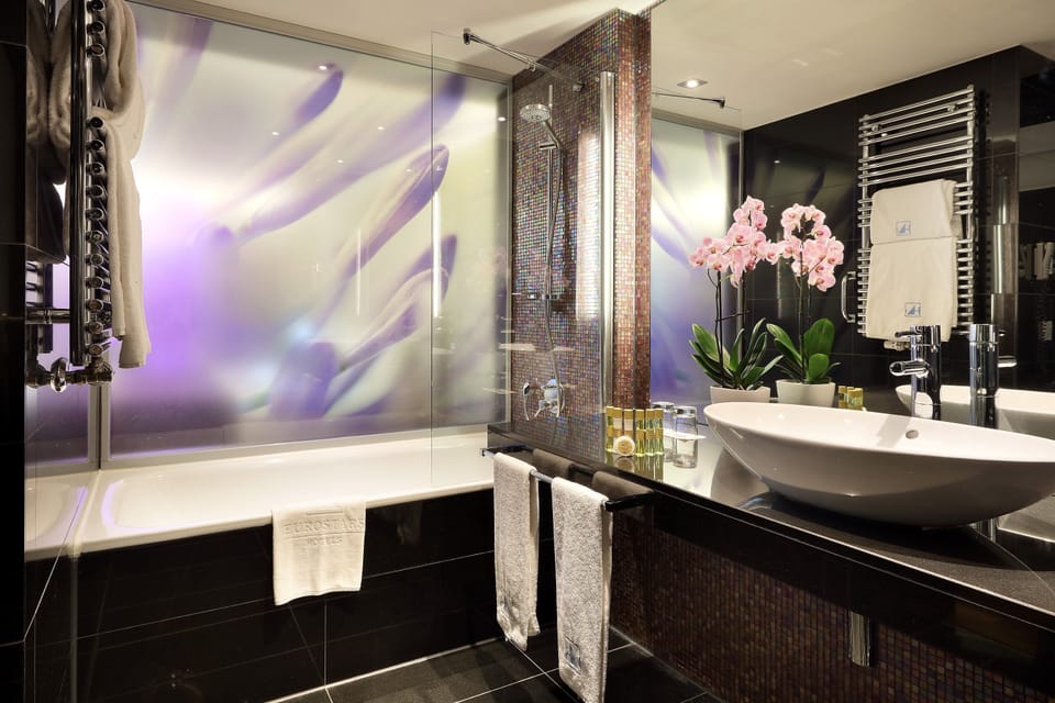 Shower, eco-friendly toiletries, hair dryer, towels