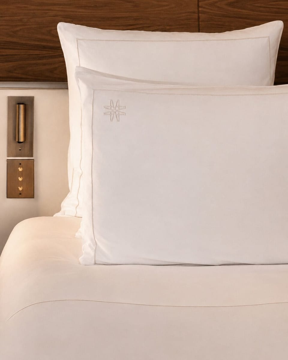 Premium bedding, down comforters, minibar, in-room safe