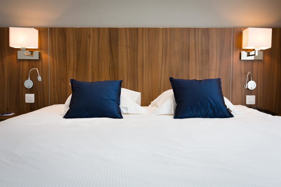 Pillowtop beds, in-room safe, blackout drapes, soundproofing