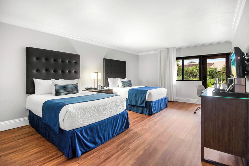 Premium bedding, down comforters, pillowtop beds, in-room safe