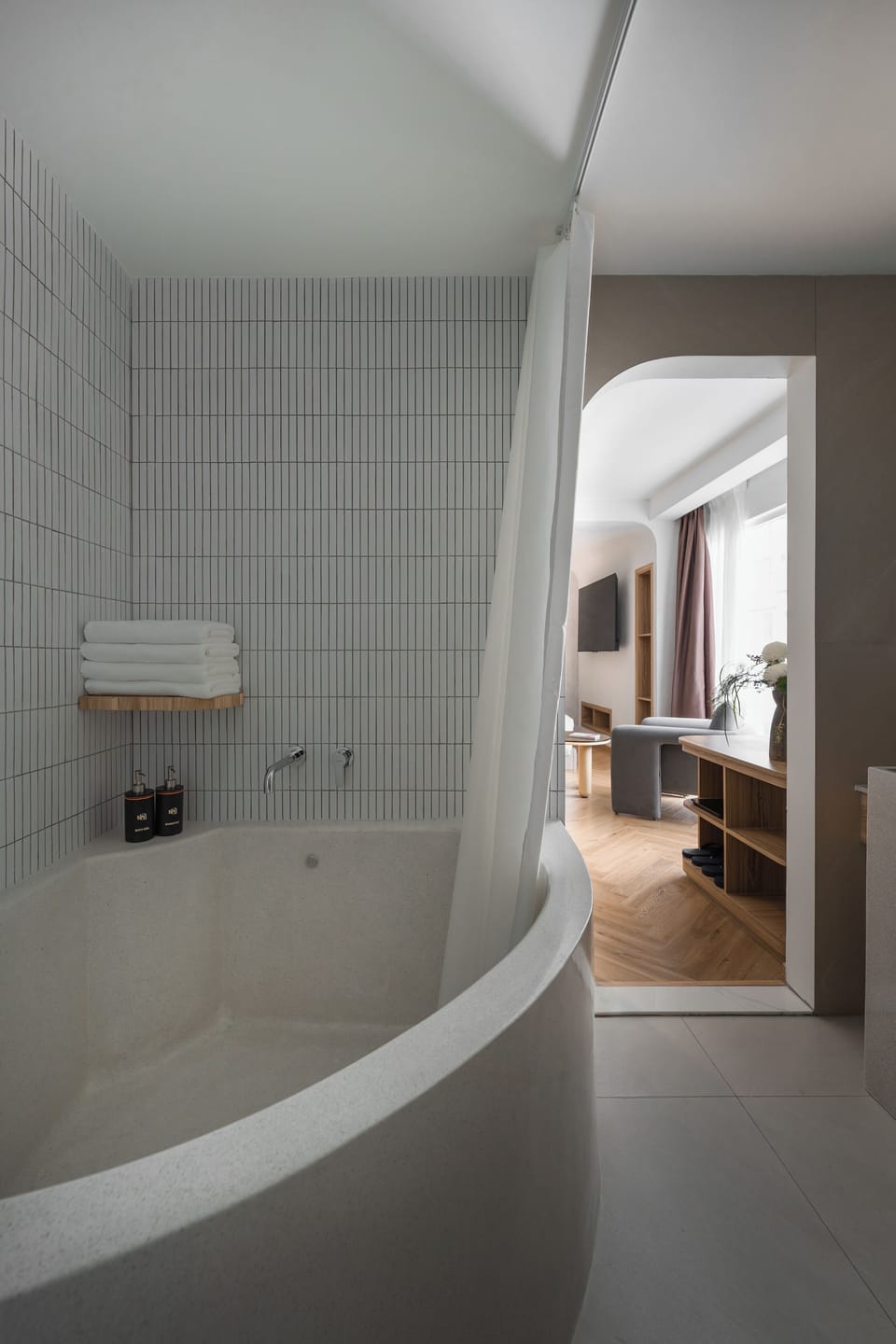 Kin Signature Suite | Bathroom | Rainfall showerhead, free toiletries, hair dryer, slippers