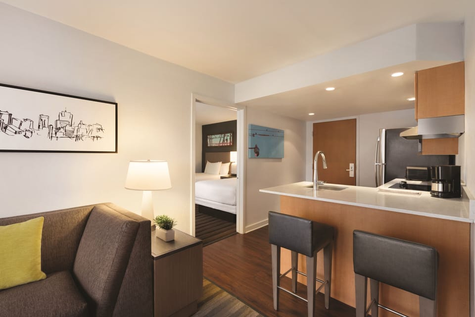 Studio Suite, 2 Double Beds | In-room safe, desk, iron/ironing board, free WiFi